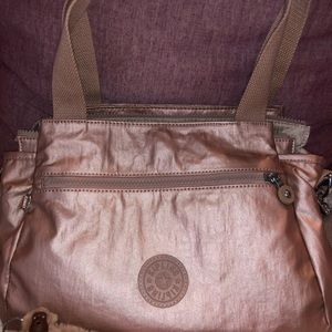 Kipling zip top shoulder bag w/crossbody strap-